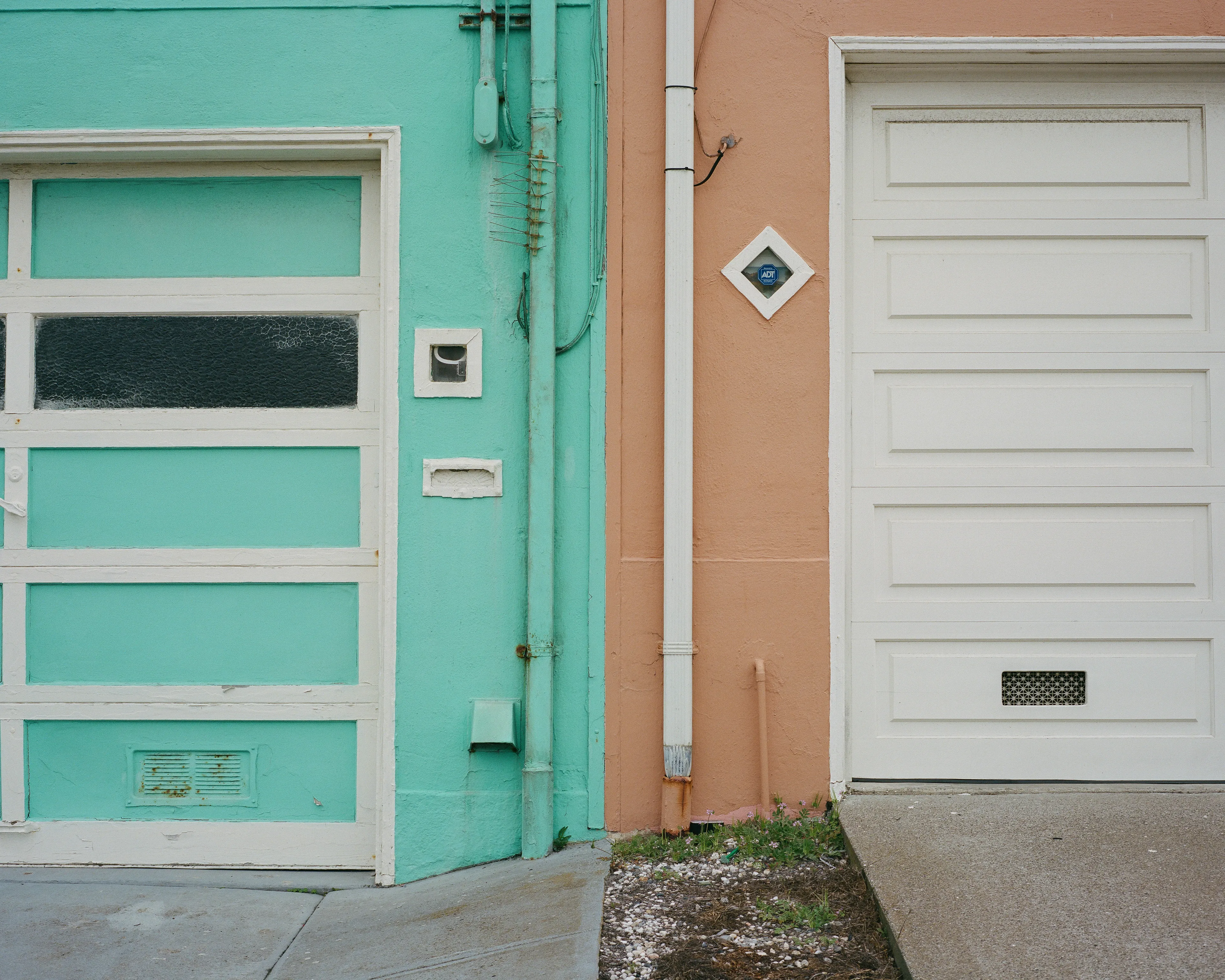 "Outer" is a collection of photographs shot in the Outer Sunset neighborhood of San Francisco, CA. 

Every home in the Outer Sunset has its own unique identity. Although we've likely never met anyone living in these homes, we're able to get a glimpse of their personality through the decorations and color choices of their outer walls.

All photos were shot with a Mamiya 7, using Kodak Portra 400 film stock.