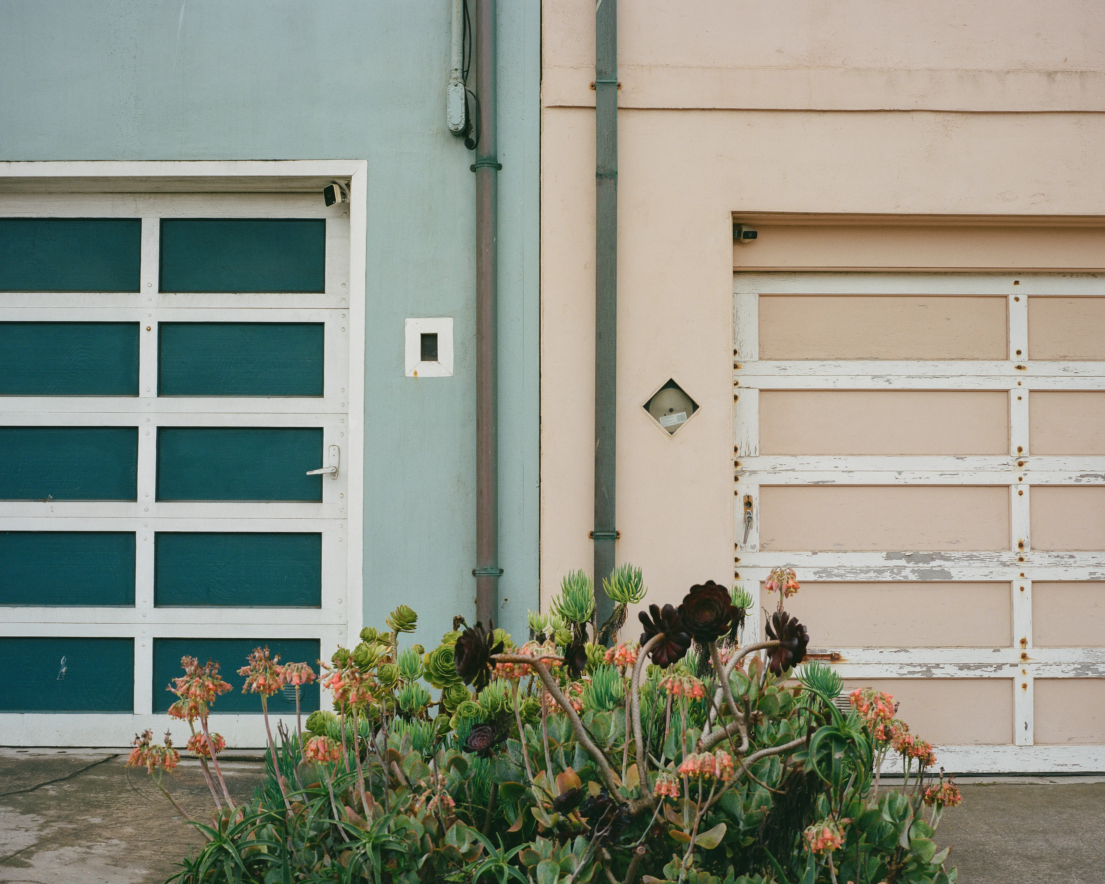 "Outer" is a collection of photographs shot in the Outer Sunset neighborhood of San Francisco, CA. 

Every home in the Outer Sunset has its own unique identity. Although we've likely never met anyone living in these homes, we're able to get a glimpse of their personality through the decorations and color choices of their outer walls.

All photos were shot with a Mamiya 7, using Kodak Portra 400 film stock.