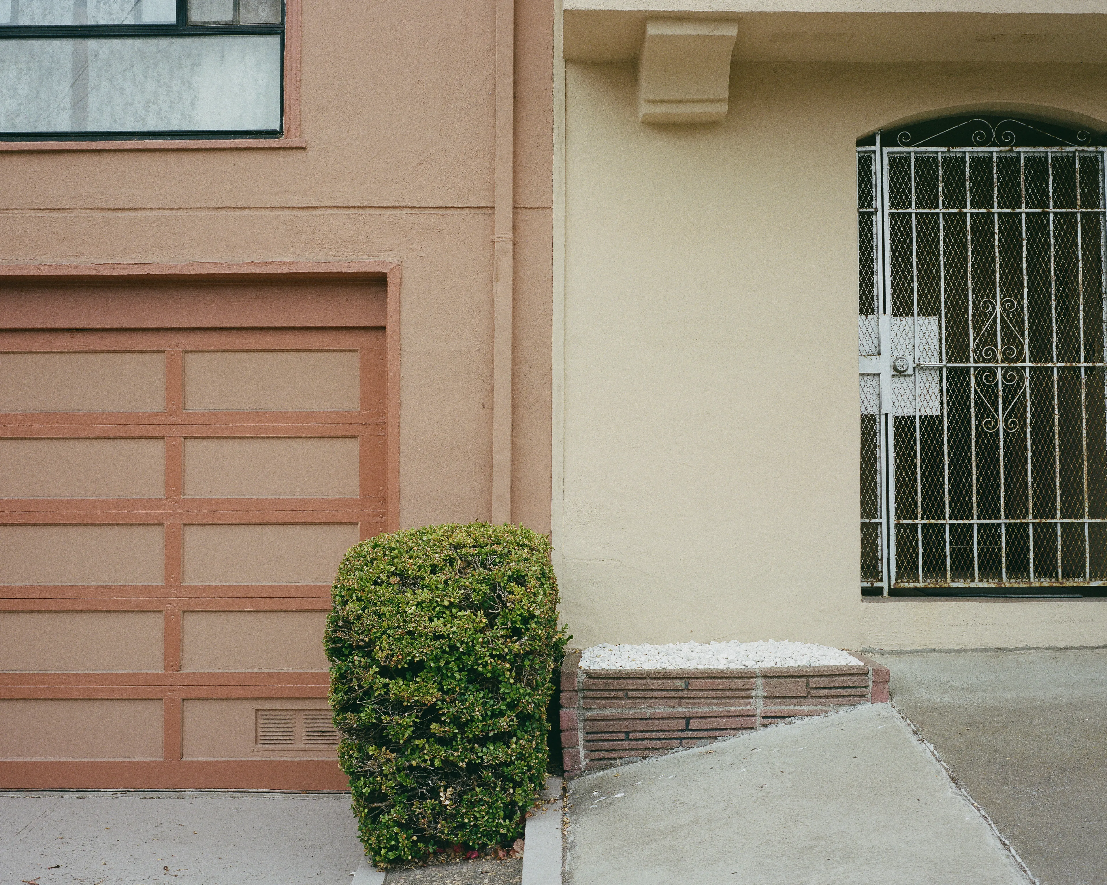 "Outer" is a collection of photographs shot in the Outer Sunset neighborhood of San Francisco, CA. 

Every home in the Outer Sunset has its own unique identity. Although we've likely never met anyone living in these homes, we're able to get a glimpse of their personality through the decorations and color choices of their outer walls.

All photos were shot with a Mamiya 7, using Kodak Portra 400 film stock.