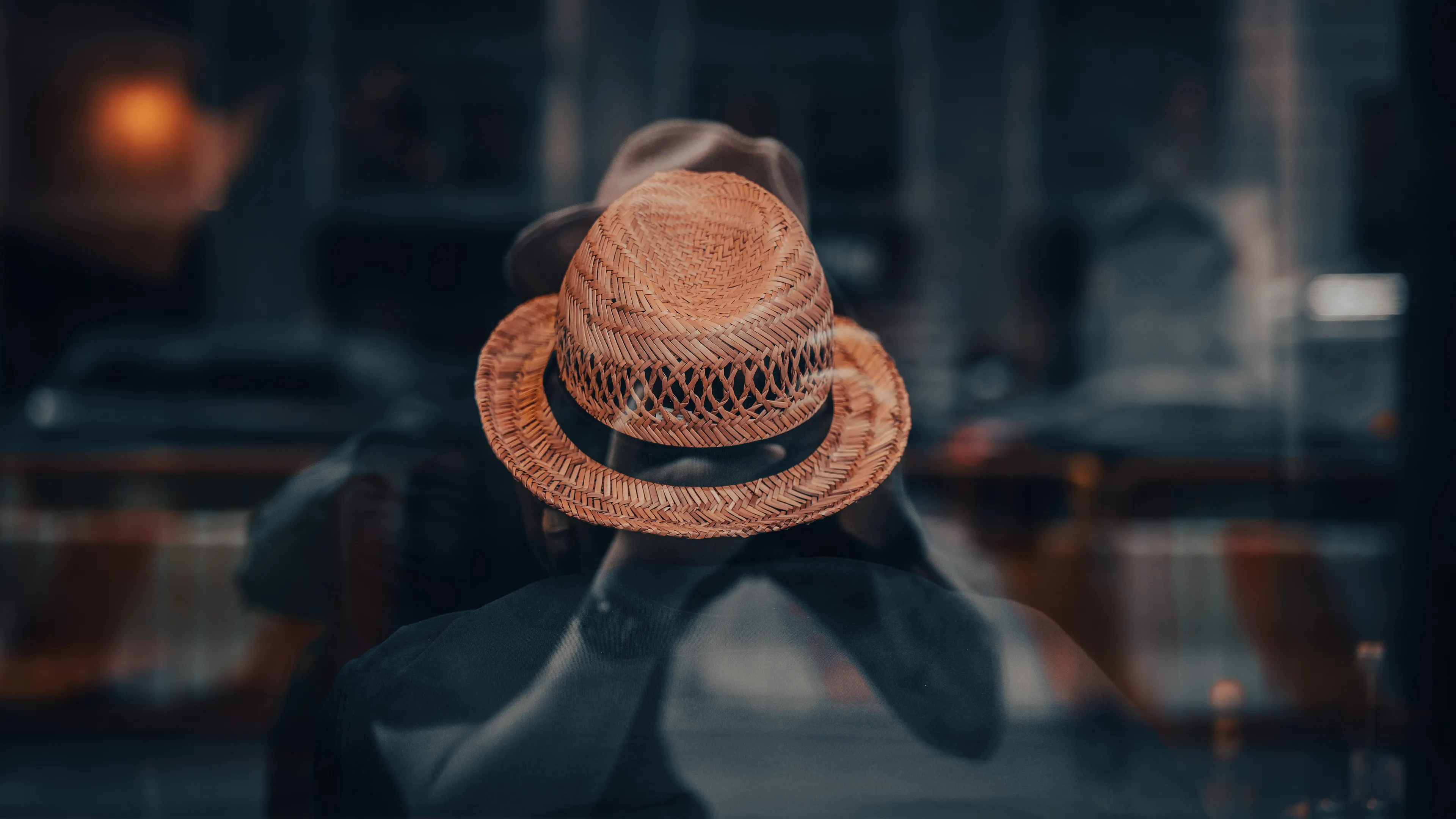 City Hats explores individuality through cinematic street portraits, inspired by my earlier series, City. Framed in 16:9, these photographs center on the backs of strangers wearing hats—highlighting style while leaving identity unseen. Each hat tells a story, echoing Lily Dache's words: "The hat is the expression of who we are, where we're going, and where we've been."

These aren't portraits of fashion, but of gesture, posture, and presence. A hat becomes a shorthand for personality—a quiet declaration of character, intention, or mood. Seen from behind, each figure feels like someone entering a movie scene mid-story—anonymous, yet already alive with narrative.

As the film Arizona Dream reminds us: "Even without pants… you didn't have to be ashamed of your ass as long as you had a hat."