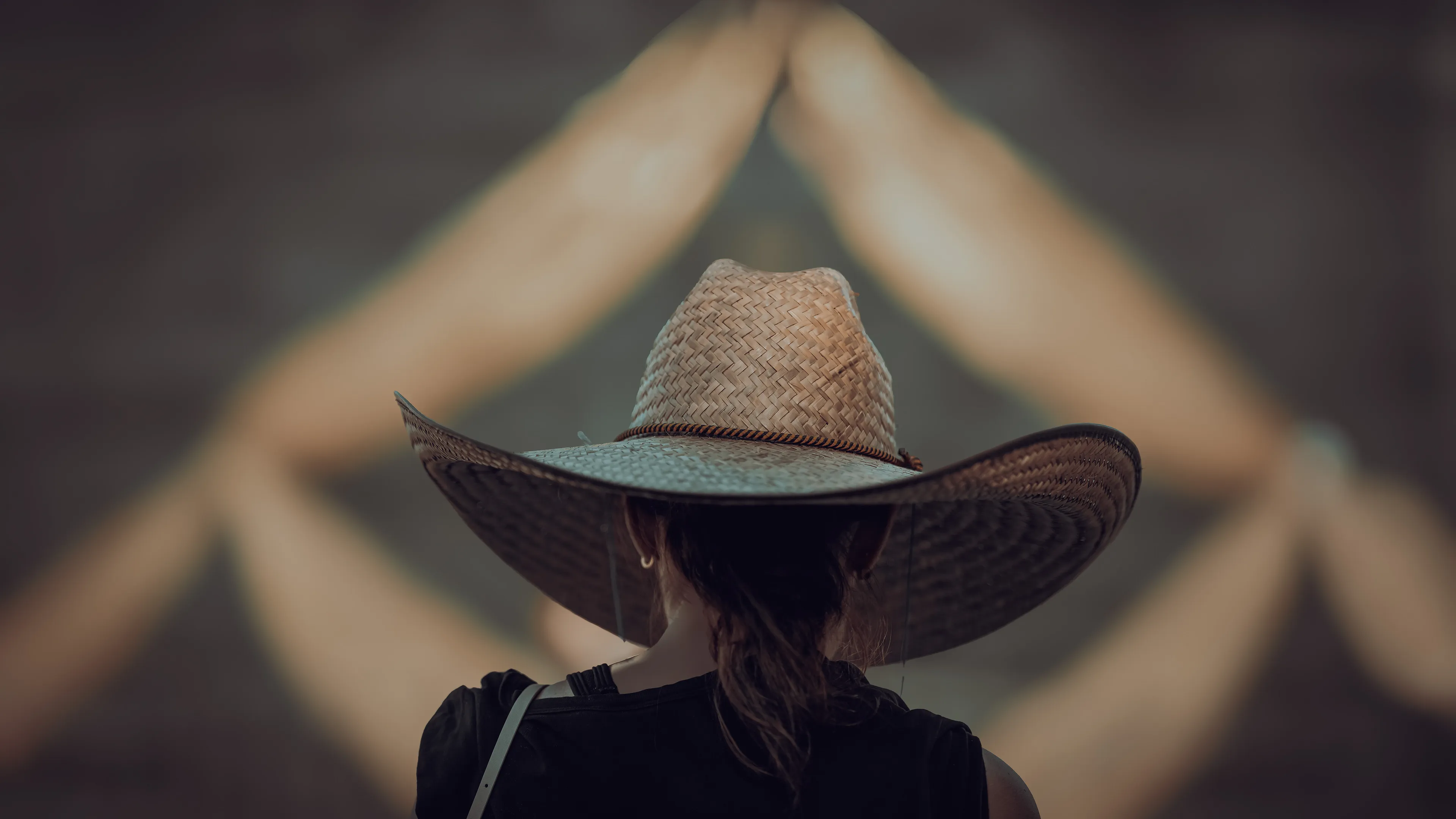 City Hats explores individuality through cinematic street portraits, inspired by my earlier series, City. Framed in 16:9, these photographs center on the backs of strangers wearing hats—highlighting style while leaving identity unseen. Each hat tells a story, echoing Lily Dache's words: "The hat is the expression of who we are, where we're going, and where we've been."

These aren't portraits of fashion, but of gesture, posture, and presence. A hat becomes a shorthand for personality—a quiet declaration of character, intention, or mood. Seen from behind, each figure feels like someone entering a movie scene mid-story—anonymous, yet already alive with narrative.

As the film Arizona Dream reminds us: "Even without pants… you didn't have to be ashamed of your ass as long as you had a hat."