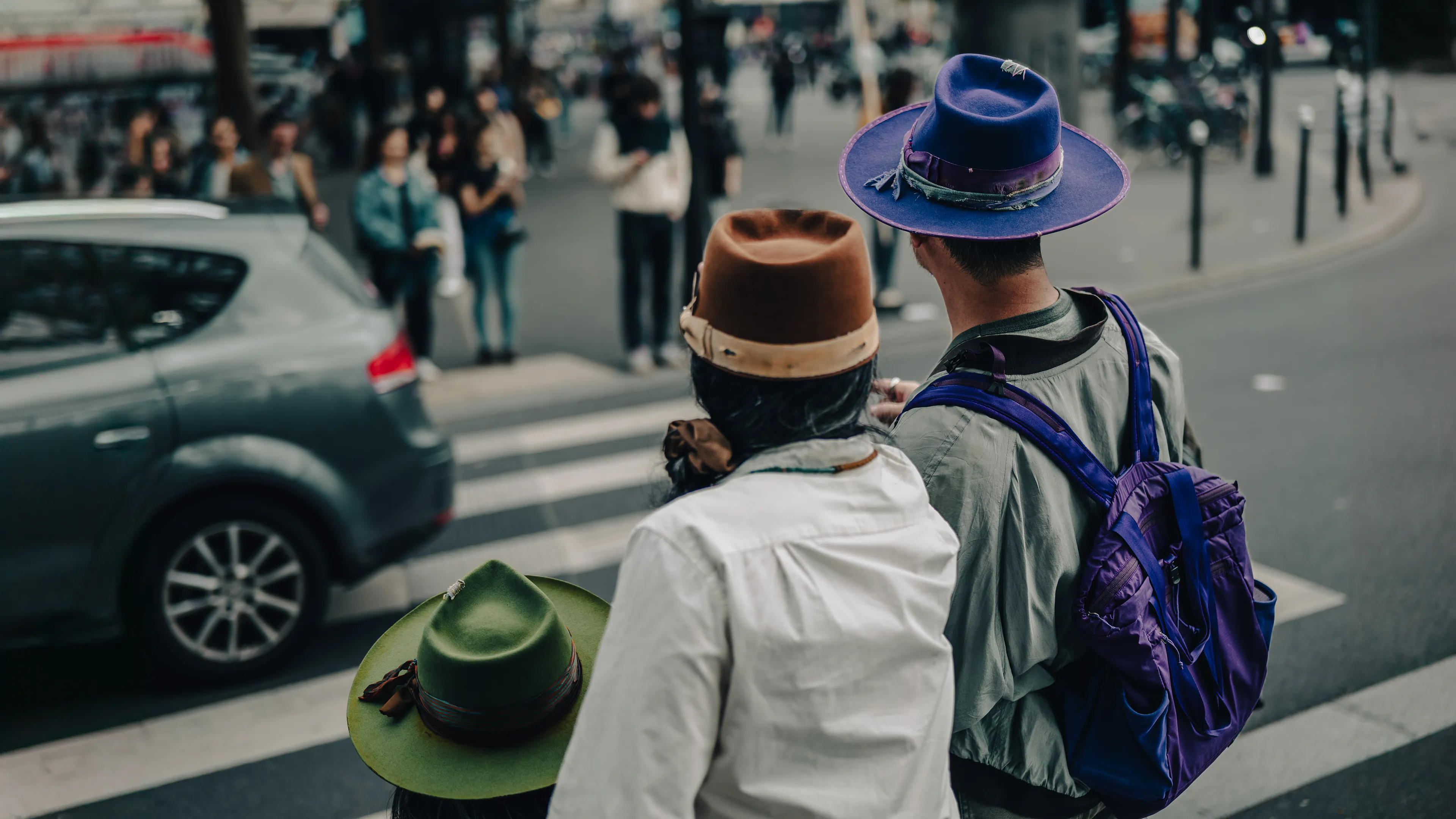 City Hats explores individuality through cinematic street portraits, inspired by my earlier series, City. Framed in 16:9, these photographs center on the backs of strangers wearing hats—highlighting style while leaving identity unseen. Each hat tells a story, echoing Lily Dache's words: "The hat is the expression of who we are, where we're going, and where we've been."

These aren't portraits of fashion, but of gesture, posture, and presence. A hat becomes a shorthand for personality—a quiet declaration of character, intention, or mood. Seen from behind, each figure feels like someone entering a movie scene mid-story—anonymous, yet already alive with narrative.

As the film Arizona Dream reminds us: "Even without pants… you didn't have to be ashamed of your ass as long as you had a hat."