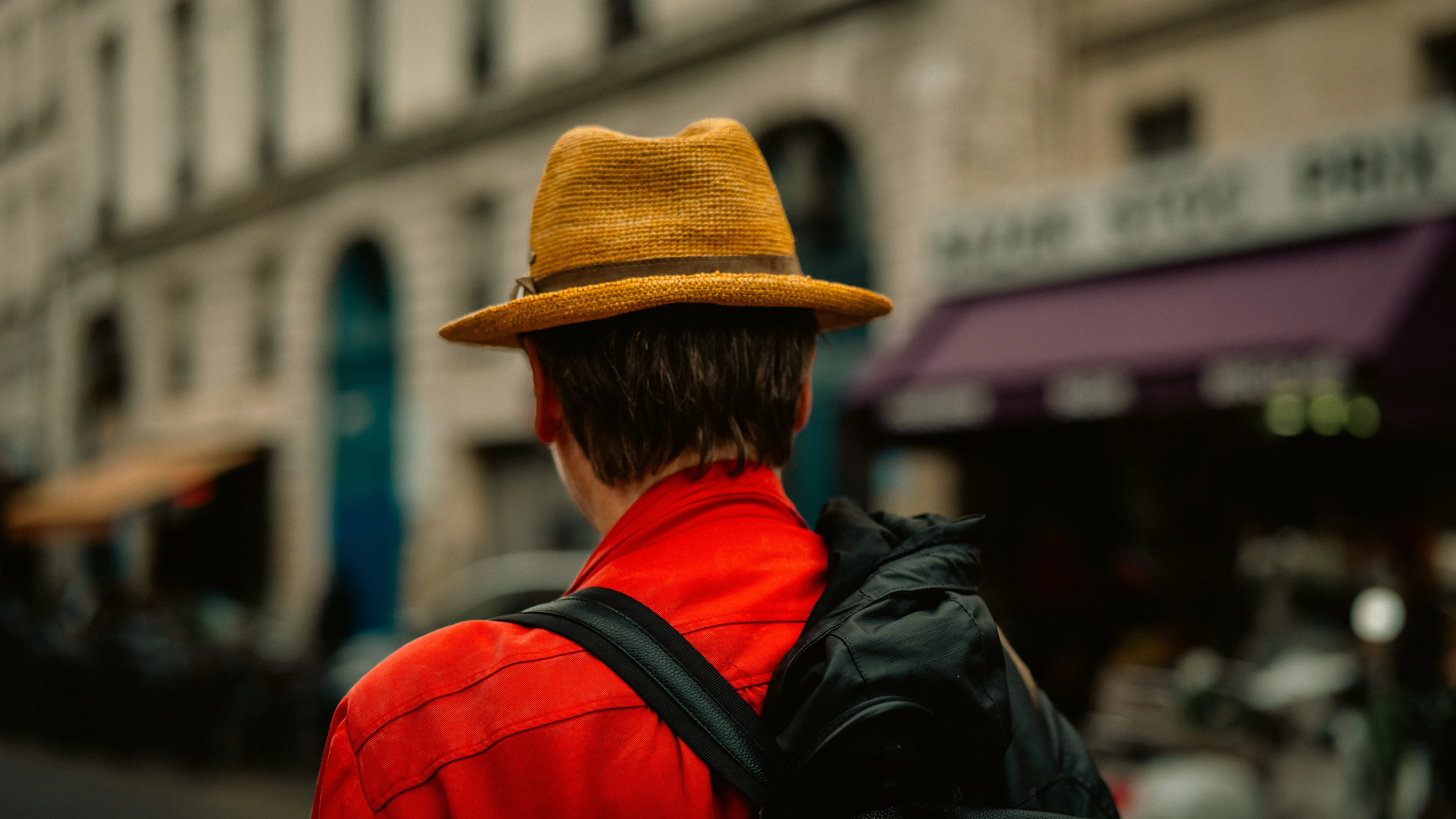 City Hats explores individuality through cinematic street portraits, inspired by my earlier series, City. Framed in 16:9, these photographs center on the backs of strangers wearing hats—highlighting style while leaving identity unseen. Each hat tells a story, echoing Lily Dache's words: "The hat is the expression of who we are, where we're going, and where we've been."

These aren't portraits of fashion, but of gesture, posture, and presence. A hat becomes a shorthand for personality—a quiet declaration of character, intention, or mood. Seen from behind, each figure feels like someone entering a movie scene mid-story—anonymous, yet already alive with narrative.

As the film Arizona Dream reminds us: "Even without pants… you didn't have to be ashamed of your ass as long as you had a hat."