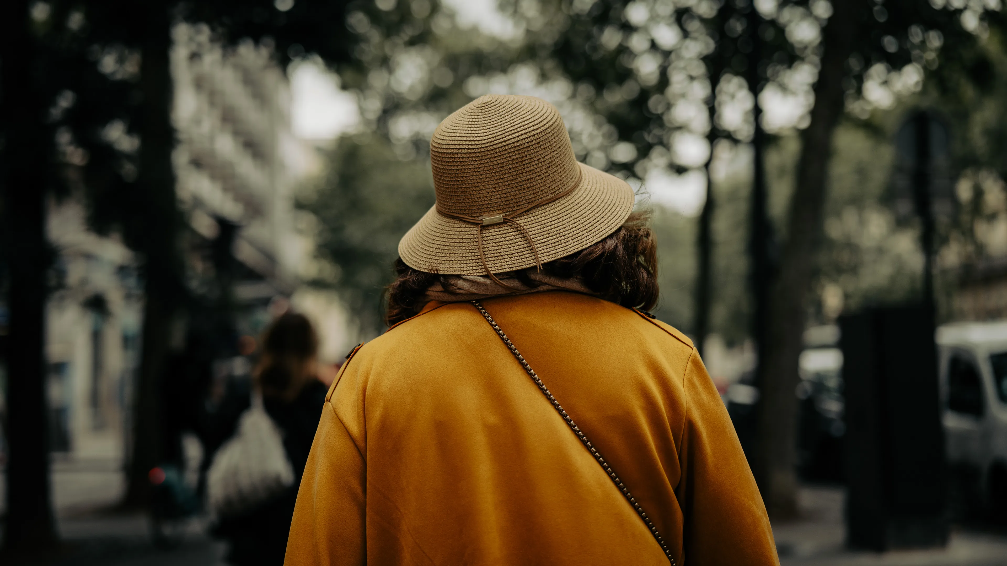 City Hats explores individuality through cinematic street portraits, inspired by my earlier series, City. Framed in 16:9, these photographs center on the backs of strangers wearing hats—highlighting style while leaving identity unseen. Each hat tells a story, echoing Lily Dache's words: "The hat is the expression of who we are, where we're going, and where we've been."

These aren't portraits of fashion, but of gesture, posture, and presence. A hat becomes a shorthand for personality—a quiet declaration of character, intention, or mood. Seen from behind, each figure feels like someone entering a movie scene mid-story—anonymous, yet already alive with narrative.

As the film Arizona Dream reminds us: "Even without pants… you didn't have to be ashamed of your ass as long as you had a hat."