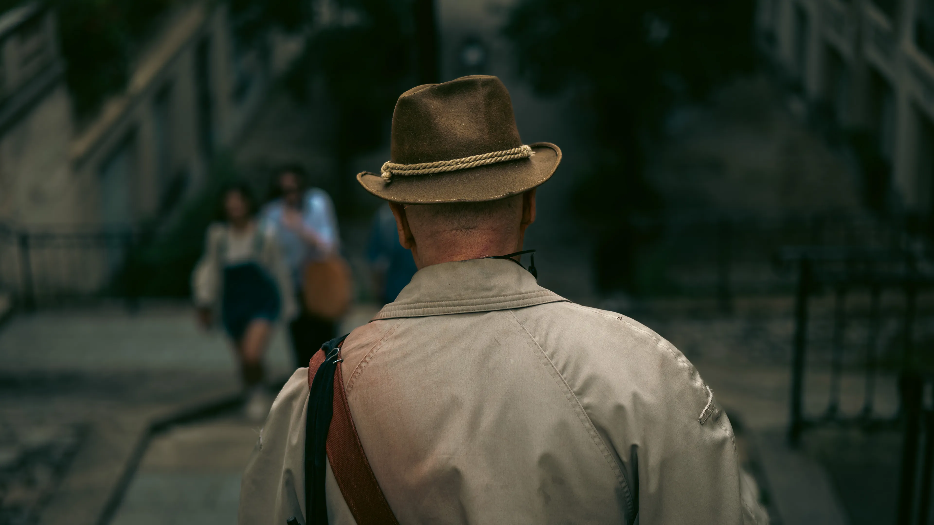 City Hats explores individuality through cinematic street portraits, inspired by my earlier series, City. Framed in 16:9, these photographs center on the backs of strangers wearing hats—highlighting style while leaving identity unseen. Each hat tells a story, echoing Lily Dache's words: "The hat is the expression of who we are, where we're going, and where we've been."

These aren't portraits of fashion, but of gesture, posture, and presence. A hat becomes a shorthand for personality—a quiet declaration of character, intention, or mood. Seen from behind, each figure feels like someone entering a movie scene mid-story—anonymous, yet already alive with narrative.

As the film Arizona Dream reminds us: "Even without pants… you didn't have to be ashamed of your ass as long as you had a hat."