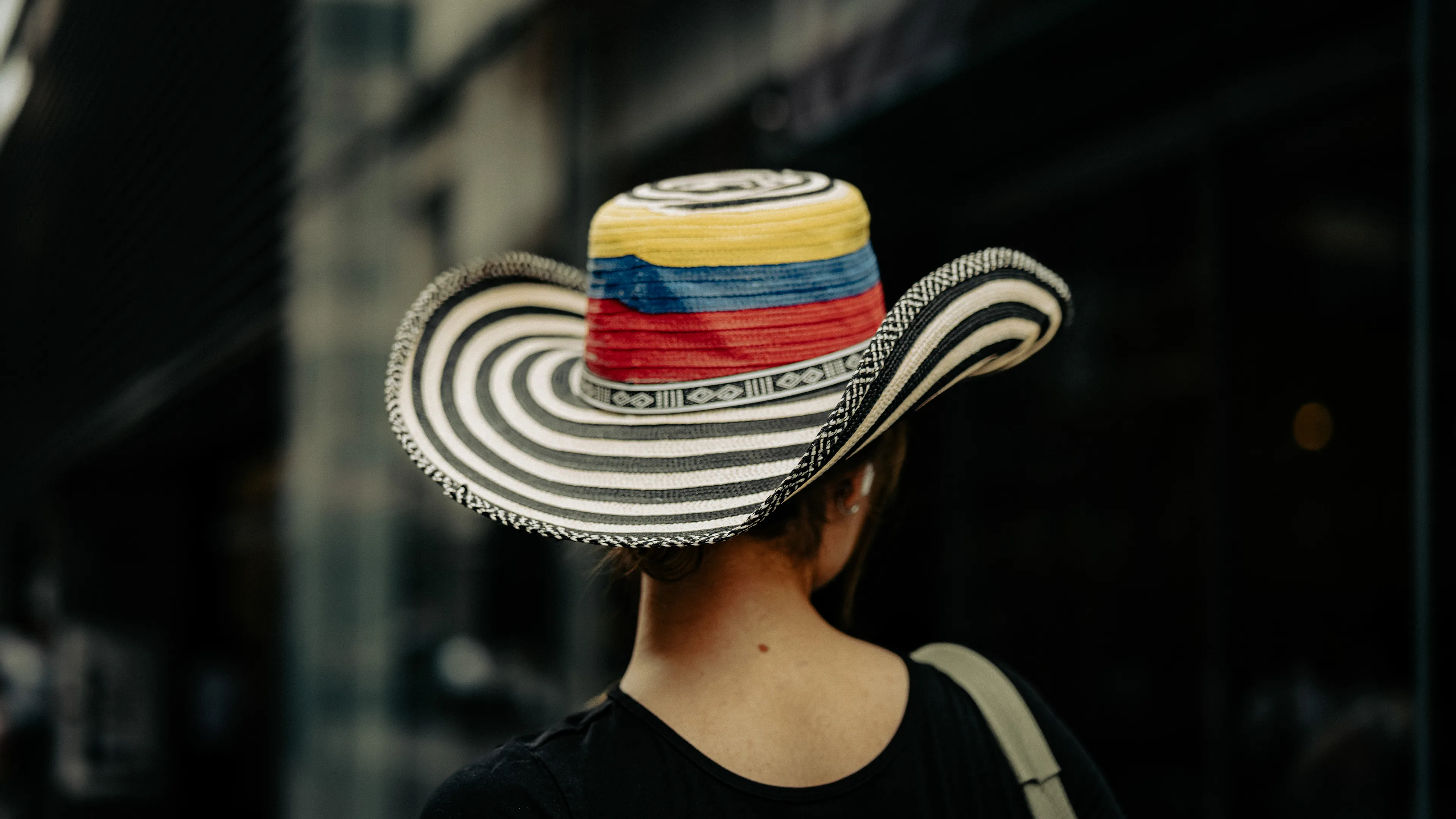 City Hats explores individuality through cinematic street portraits, inspired by my earlier series, City. Framed in 16:9, these photographs center on the backs of strangers wearing hats—highlighting style while leaving identity unseen. Each hat tells a story, echoing Lily Dache's words: "The hat is the expression of who we are, where we're going, and where we've been."

These aren't portraits of fashion, but of gesture, posture, and presence. A hat becomes a shorthand for personality—a quiet declaration of character, intention, or mood. Seen from behind, each figure feels like someone entering a movie scene mid-story—anonymous, yet already alive with narrative.

As the film Arizona Dream reminds us: "Even without pants… you didn't have to be ashamed of your ass as long as you had a hat."