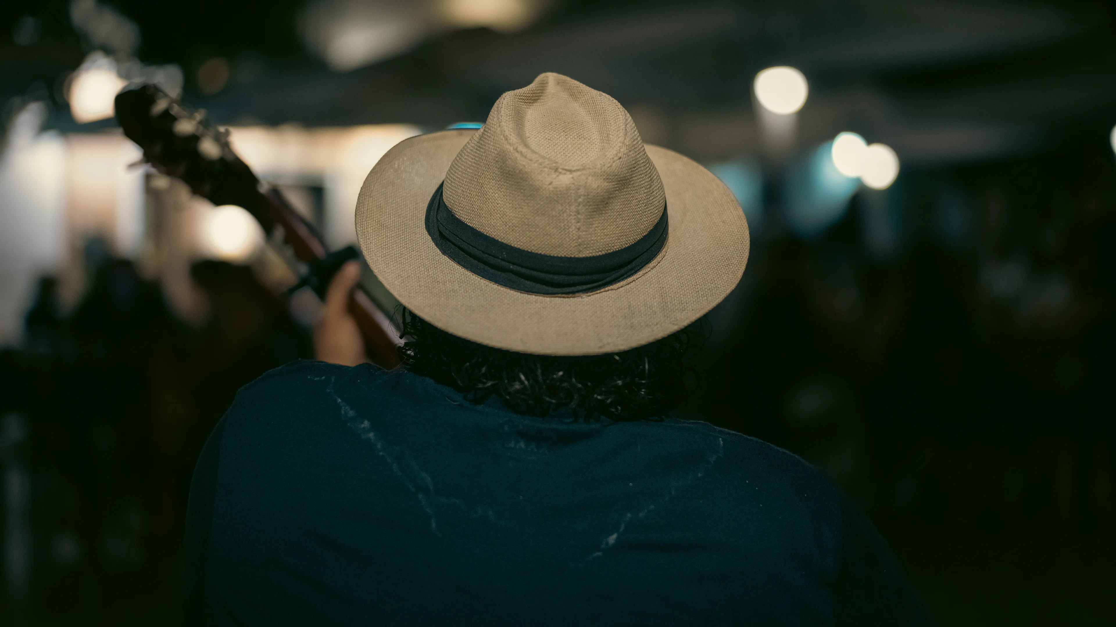 City Hats explores individuality through cinematic street portraits, inspired by my earlier series, City. Framed in 16:9, these photographs center on the backs of strangers wearing hats—highlighting style while leaving identity unseen. Each hat tells a story, echoing Lily Dache's words: "The hat is the expression of who we are, where we're going, and where we've been."

These aren't portraits of fashion, but of gesture, posture, and presence. A hat becomes a shorthand for personality—a quiet declaration of character, intention, or mood. Seen from behind, each figure feels like someone entering a movie scene mid-story—anonymous, yet already alive with narrative.

As the film Arizona Dream reminds us: "Even without pants… you didn't have to be ashamed of your ass as long as you had a hat."