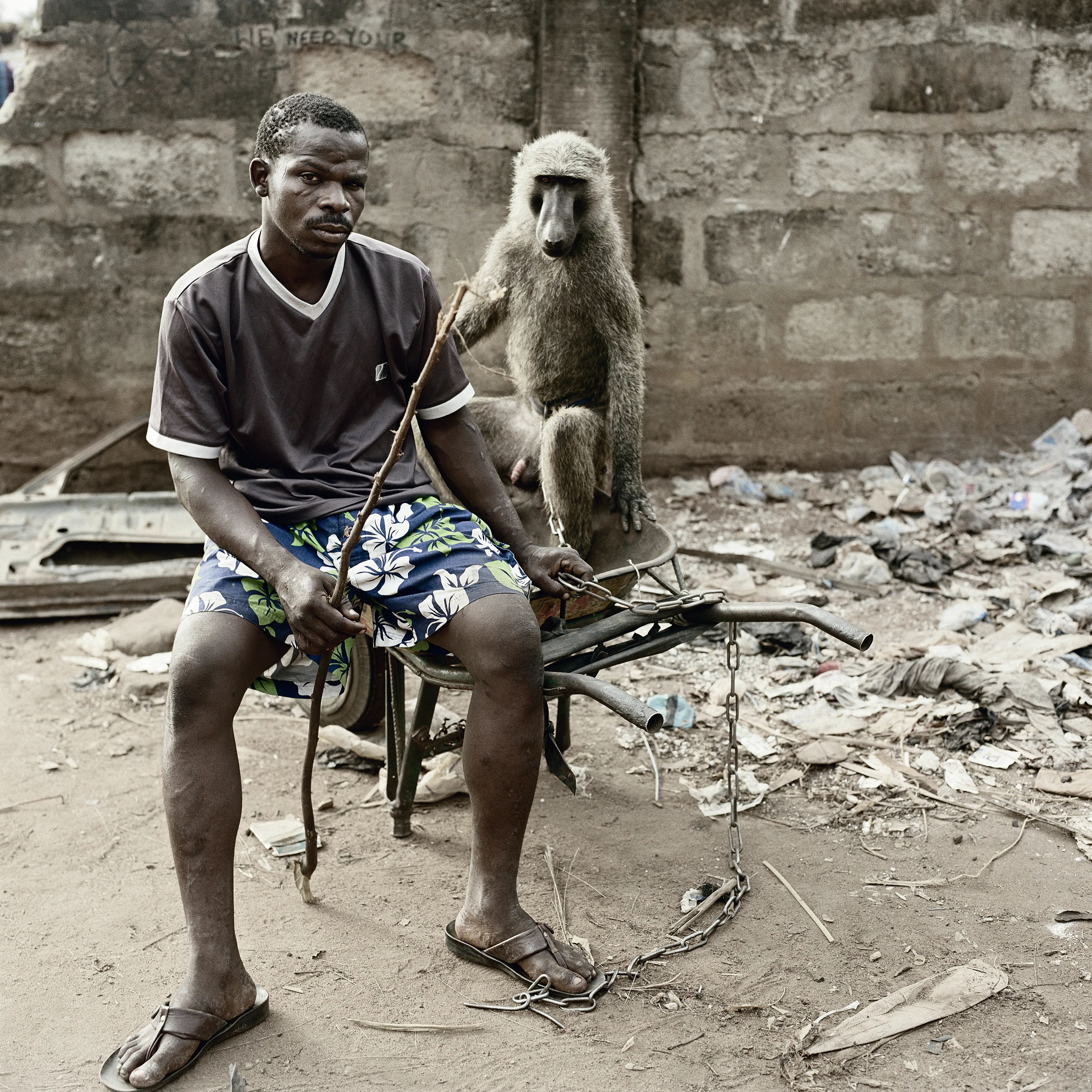 Pieter Hugo’s The Hyena and Other Men (2005-2007) is a portrait series produced in Nigeria about a community of ‘hyena men’ who together form a community around the ownership of exotic animals, predominantly hyenas, but pythons and monkeys as well. Dubbed the “Gadawan Kura” (which roughly translates from Hausa to “hyena handlers”), these men make a living by capturing, training, and performing with these animals.

Edition: 1 of 1