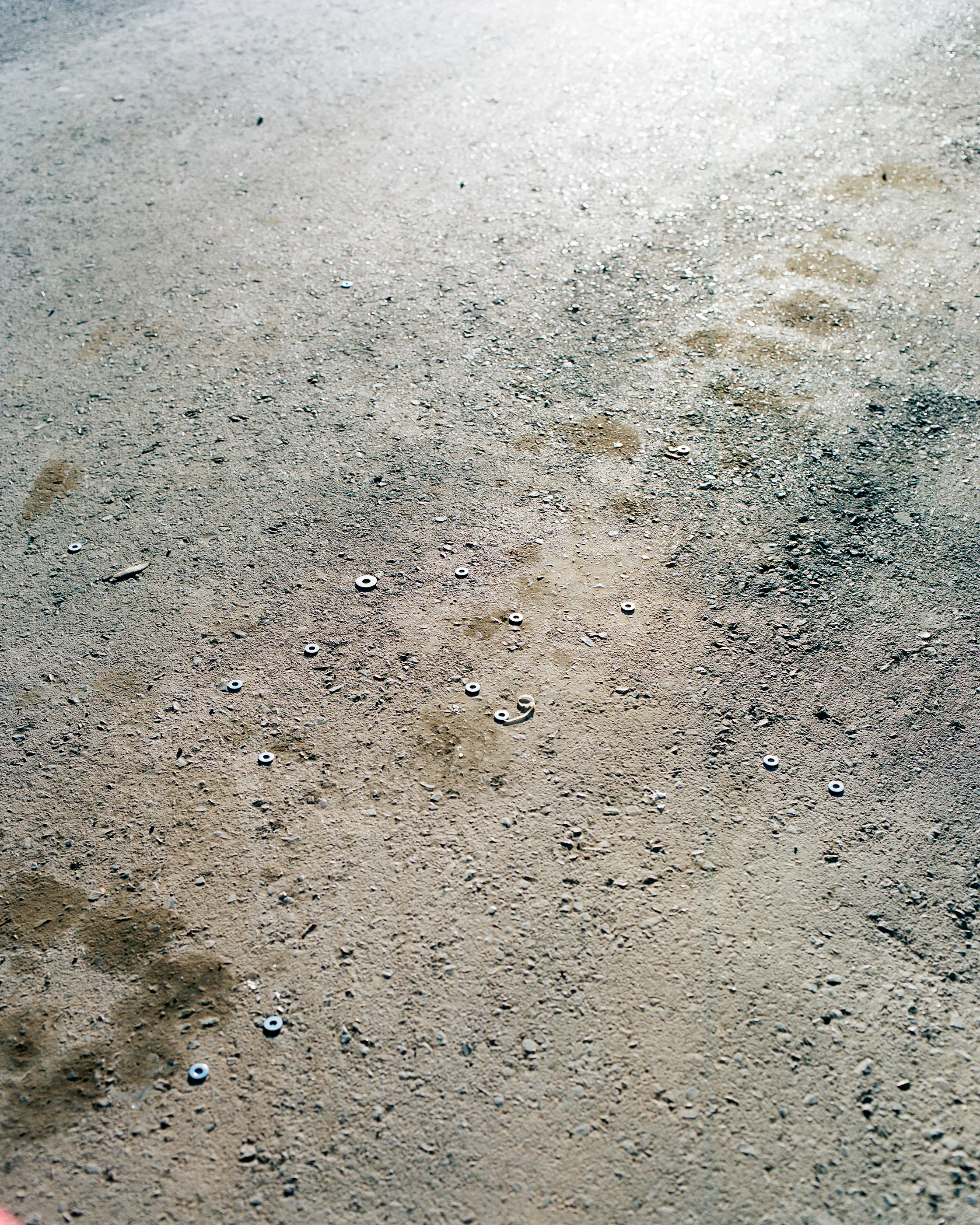 The Infinite Corridor was made in a series of long walks through the sunny streets of northern Mexico. 

Photographed in a chaotic, fragmented style, I hope this collection feels as uncomfortable as it is to walk through the streets of these cities.