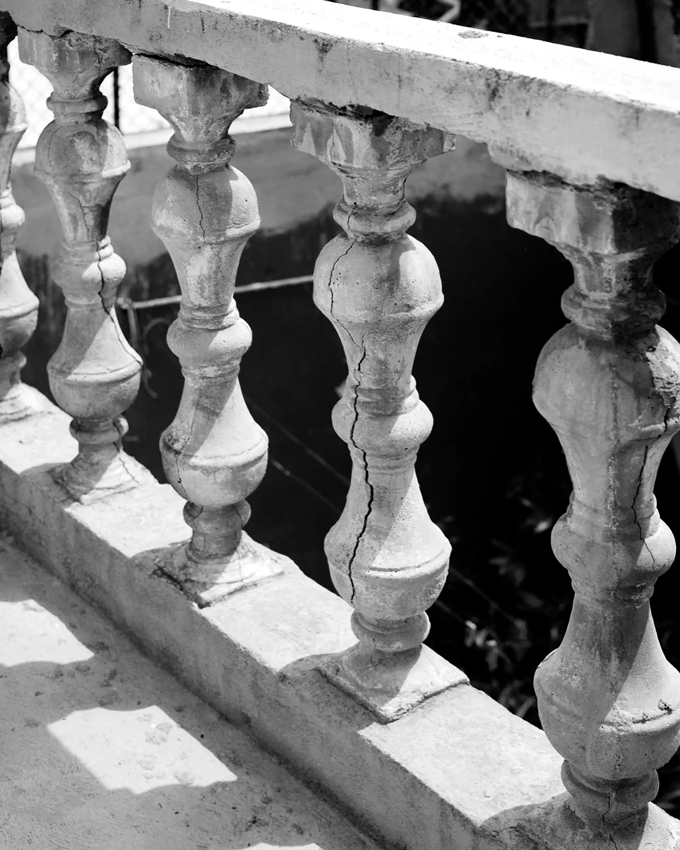 The Infinite Corridor was made in a series of long walks through the sunny streets of northern Mexico. 

Photographed in a chaotic, fragmented style, I hope this collection feels as uncomfortable as it is to walk through the streets of these cities.