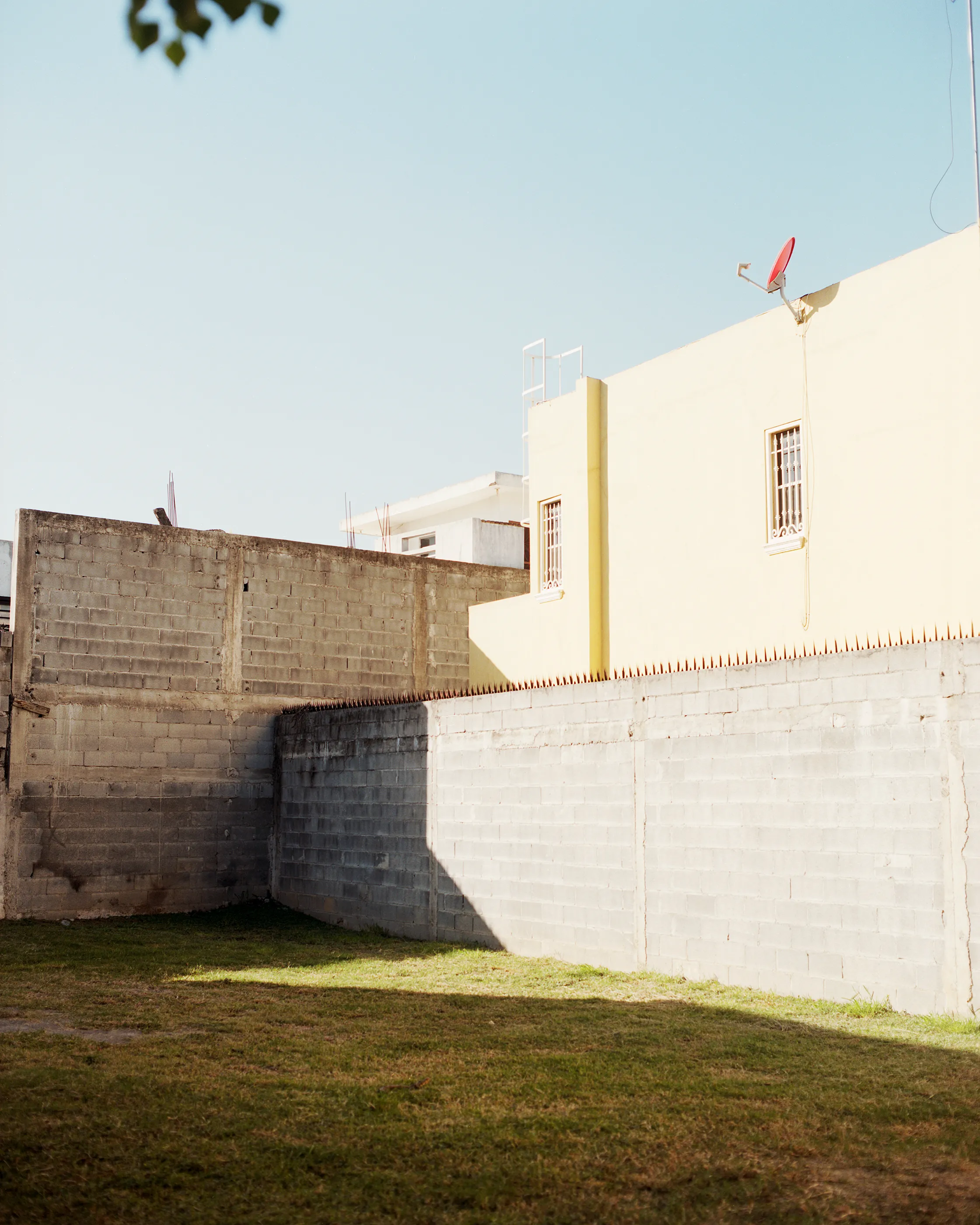 The Infinite Corridor was made in a series of long walks through the sunny streets of northern Mexico. 

Photographed in a chaotic fragmented style, I hope this collection feels as uncomfortable as it is to walk through the streets of these cities.