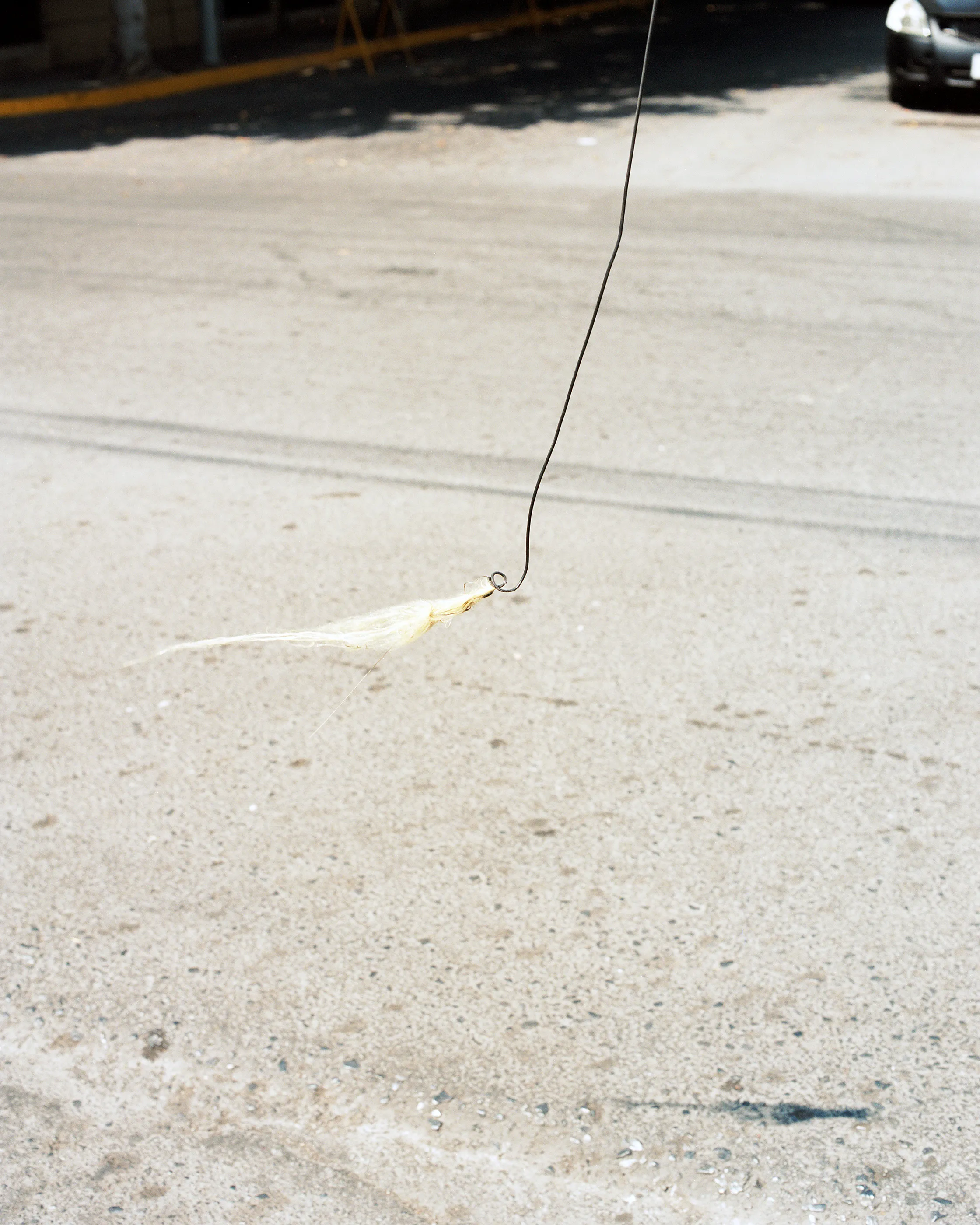 The Infinite Corridor was made in a series of long walks through the sunny streets of northern Mexico. 

Photographed in a chaotic, fragmented style, I hope this collection feels as uncomfortable as it is to walk through the streets of these cities.