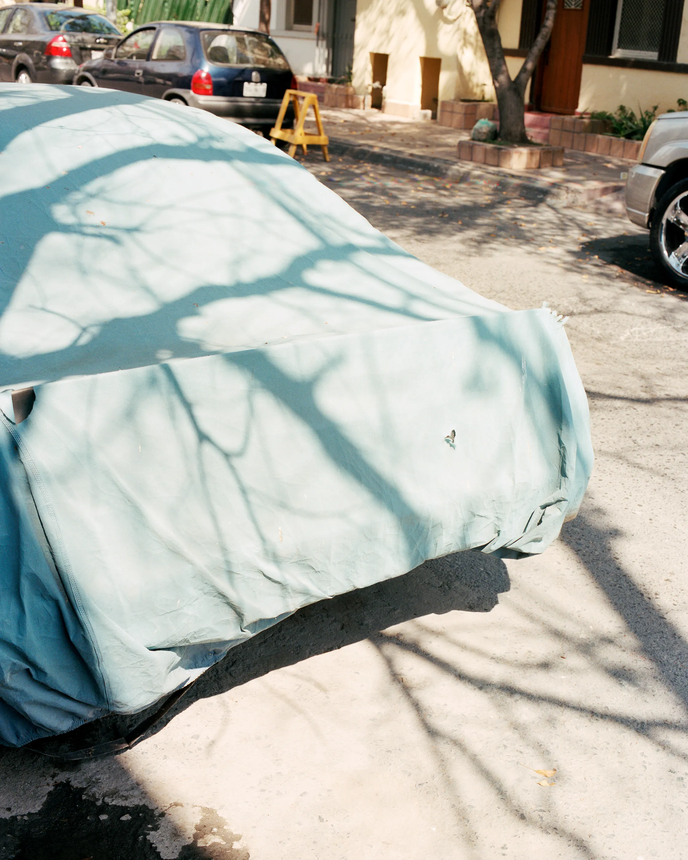 The Infinite Corridor was made in a series of long walks through the sunny streets of northern Mexico. 

Photographed in a chaotic, fragmented style, I hope this collection feels as uncomfortable as it is to walk through the streets of these cities.