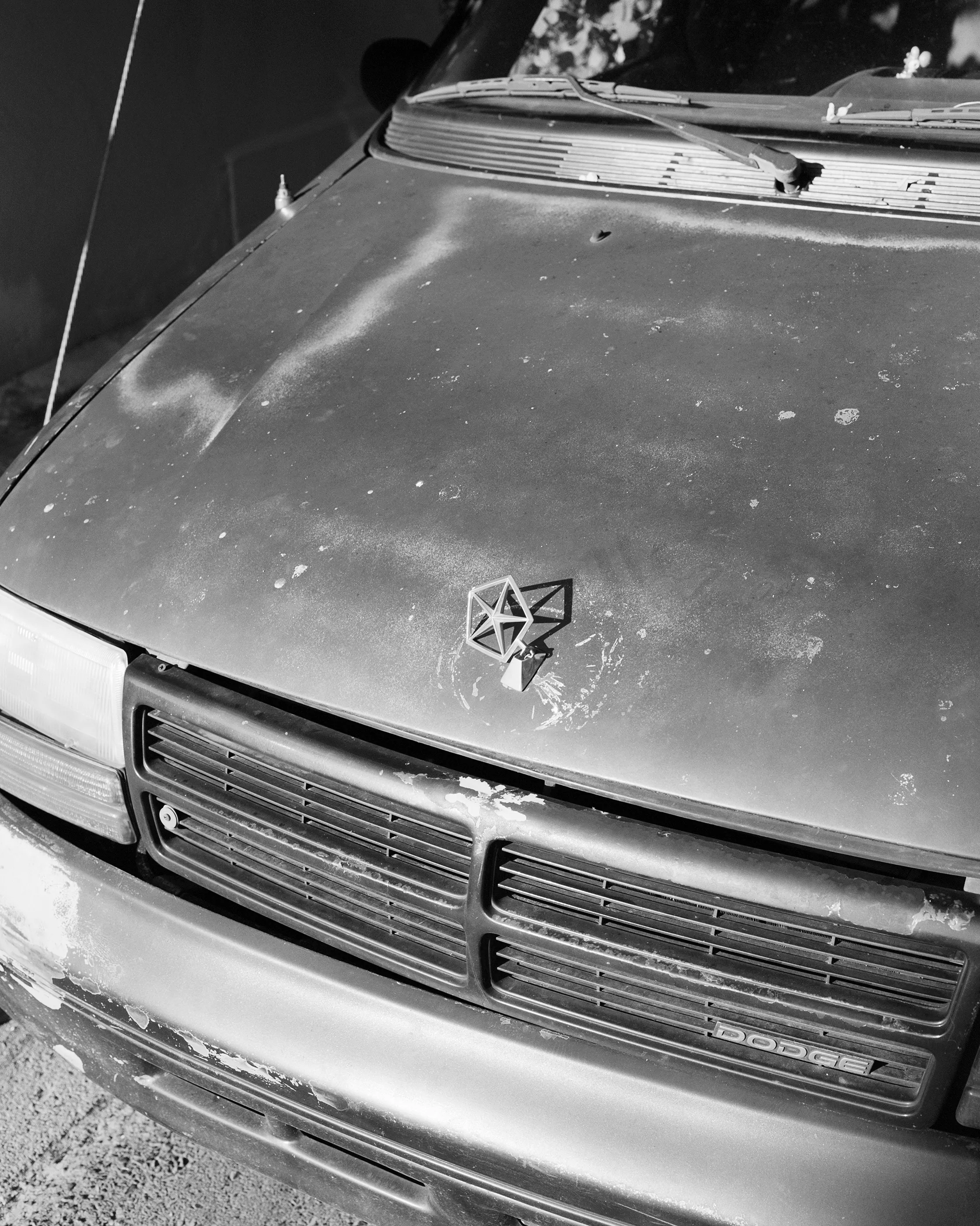 The Infinite Corridor was made in a series of long walks through the sunny streets of northern Mexico. 

Photographed in a chaotic, fragmented style, I hope this collection feels as uncomfortable as it is to walk through the streets of these cities.