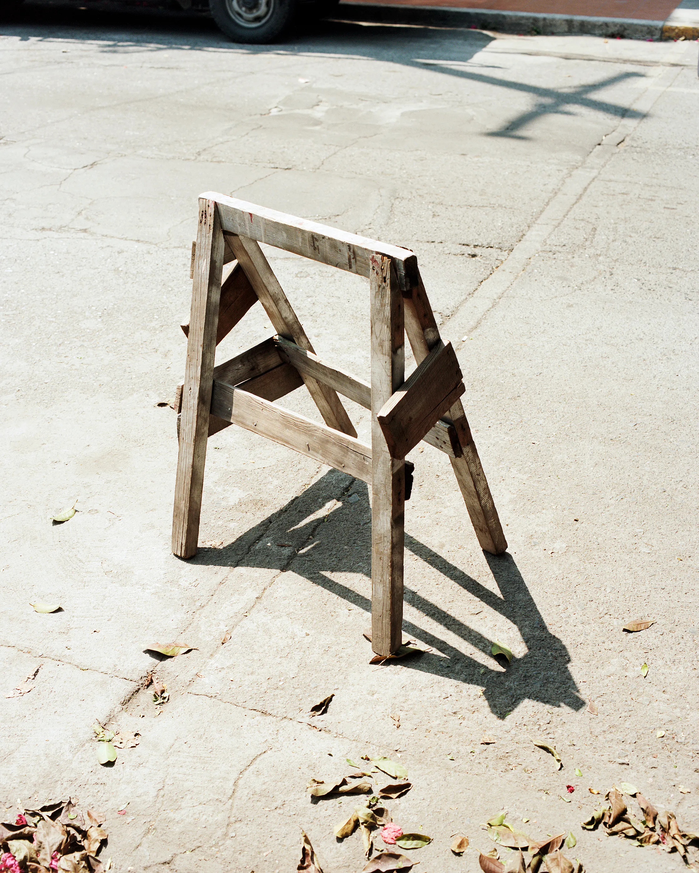 The Infinite Corridor was made in a series of long walks through the sunny streets of northern Mexico. 

Photographed in a chaotic, fragmented style, I hope this collection feels as uncomfortable as it is to walk through the streets of these cities.