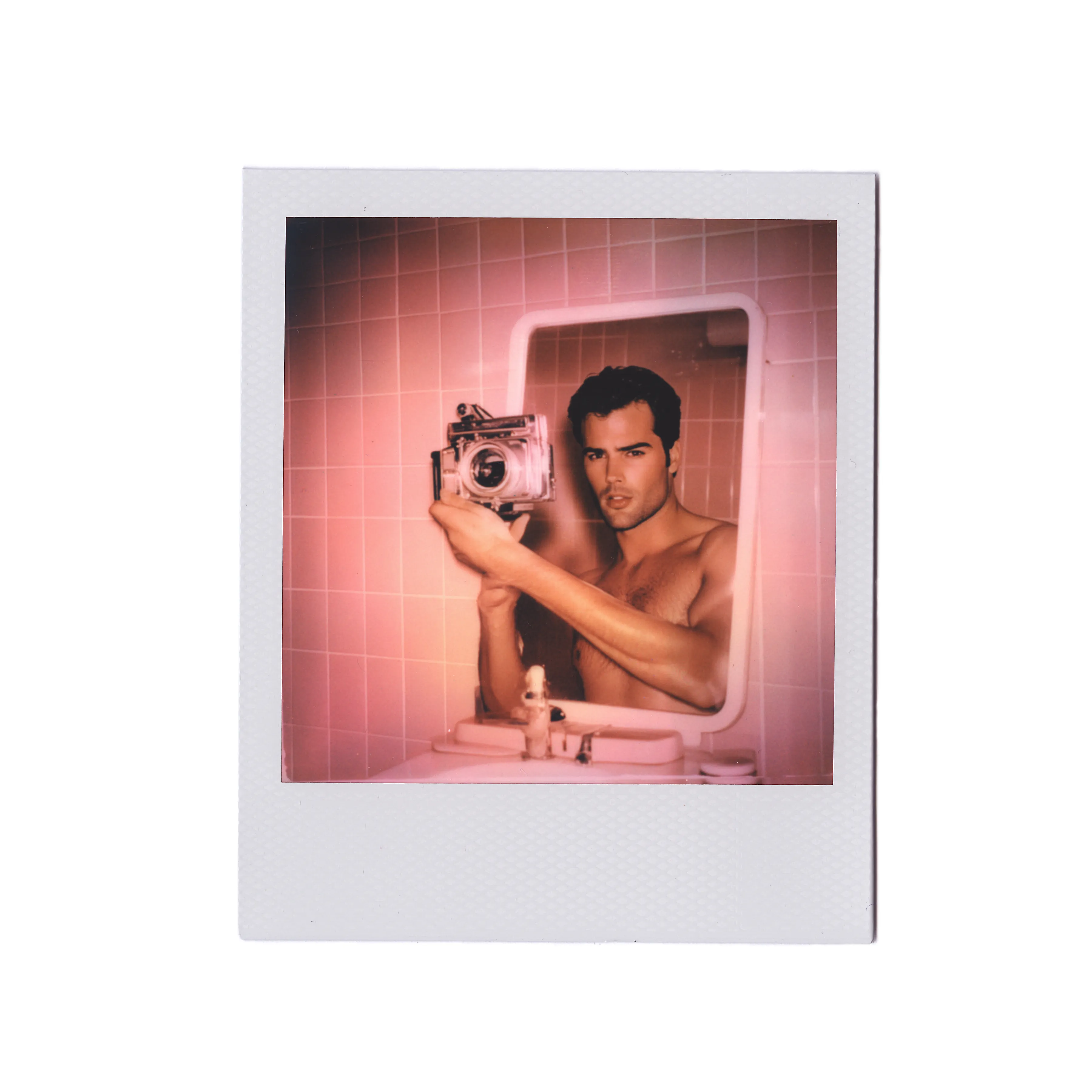 In 1962, Detective Jack Crimson of the LAPD bought himself a Polaroid camera. 

Known for his square jaw and closed-off heart, he soon found himself spending hours in the bathroom mirror, trying to take the perfect self-portrait. Trying to see what others saw in him.