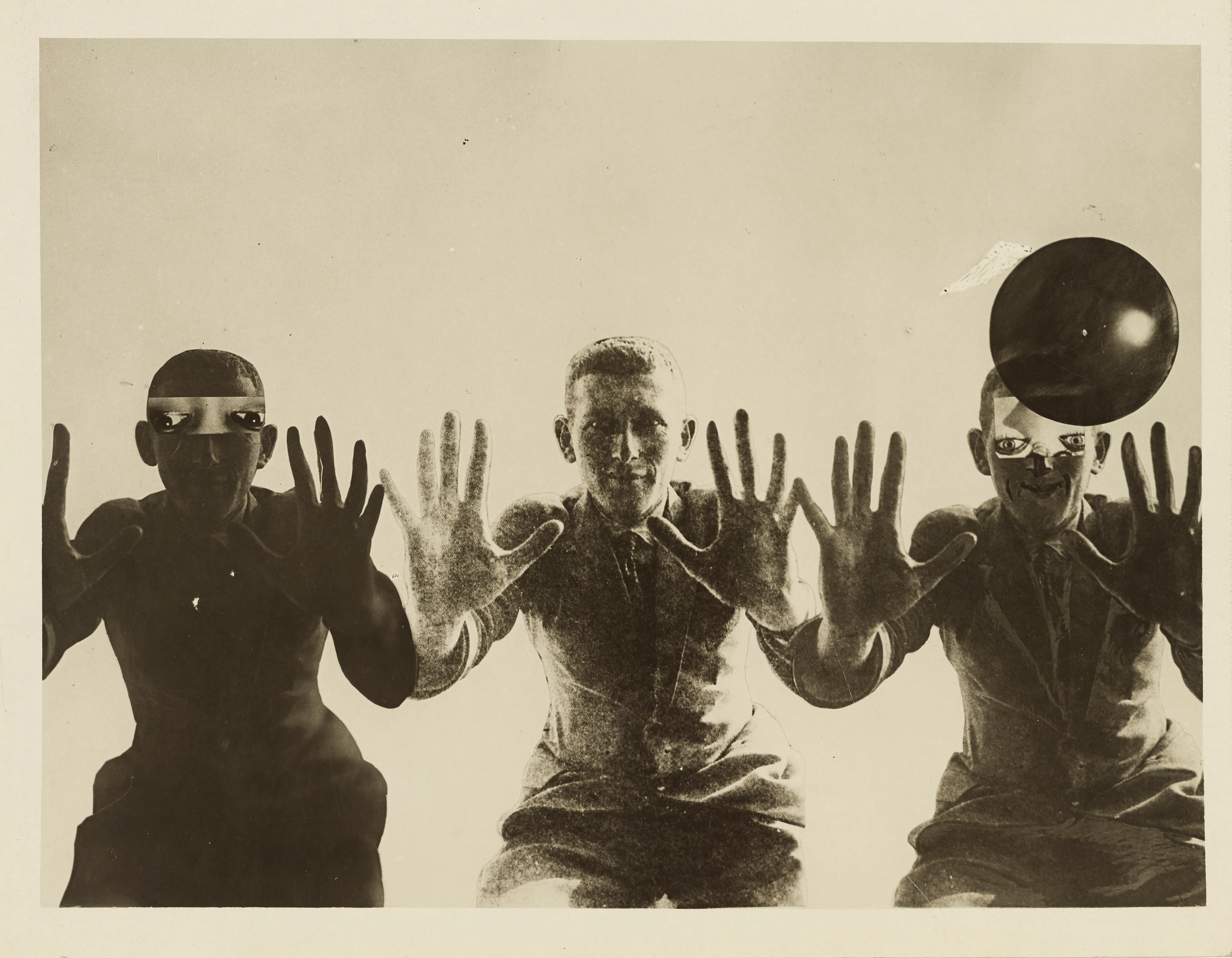 Photoplastic.

The Transformation/Anxiety Dream, 1925, Breuer’s figure is repeated, but altered by the addition of a ball and upside-down eyes from other faces (one pair belonging to the silent film star Mae Murray). Pencil lines around the figures indicate cropping for this print, in which the three Breuers are enlarged and the white space around them is eliminated. The disturbing eyes in this version perhaps gave rise to the ambiguous alternate title Anxiety Dream. Ultimately, Moholy-Nagy adapted the series to advertise the Schocken Department Store in Nuremberg.

The legacy of Hungarian artist Laszlo Moholy-Nagy is among the most cherished in the lineage of photographic art, and he can be defined as a visionary whose radical experiments with photography entirely re-imagined the possibilities for the medium. Working in the early 20th century when photography was not considered a form of high art, Moholy-Nagy actively sought to break down boundaries and find new languages of photographic discourse. In doing so, he left behind an oeuvre of visual ideas that have provided artistic license to a century’s worth of photographers to experiment boldly beyond the conventional definitions of what photography is expected to be.

Edition: 1 of 1