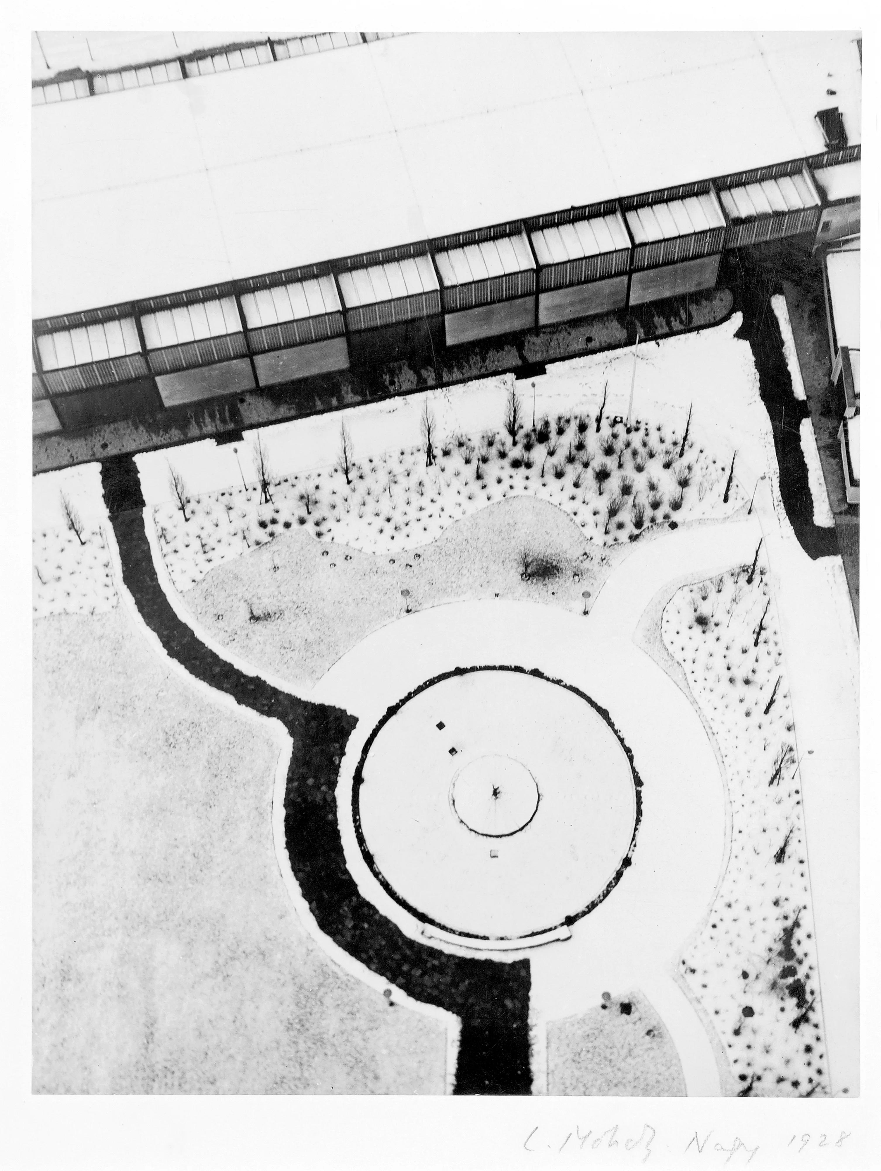 Bauhaus Photography.

Moholy-Nagy took a series of photographs of the Berlin Radio Tower, a 450-foot-tall structure completed in 1926, employing aerial perspective. The series exemplifies the artist's belief that photography's primary function was to allow the viewer to engage with reality in previously impossible ways: allowing new levels of detail, new kinds of focus and coloring, perspective and scope. His ideas were expressed in an influential photography book published in 1927 suitably titled Neue Sehen ("New Vision") which, as Lynne Warren notes, explores "the perspectives offered by the modern city - its high-rises and dramatic scales, its geometries of contrast, its industrial patterns and texts".

The legacy of Hungarian artist Laszlo Moholy-Nagy is among the most cherished in the lineage of photographic art, and he can be defined as a visionary whose radical experiments with photography entirely re-imagined the possibilities for the medium. Working in the early 20th century when photography was not considered a form of high art, Moholy-Nagy actively sought to break down boundaries and find new languages of photographic discourse. In doing so, he left behind an oeuvre of visual ideas that have provided artistic license to a century’s worth of photographers to experiment boldly beyond the conventional definitions of what photography is expected to be.

Edition: 1 of 1