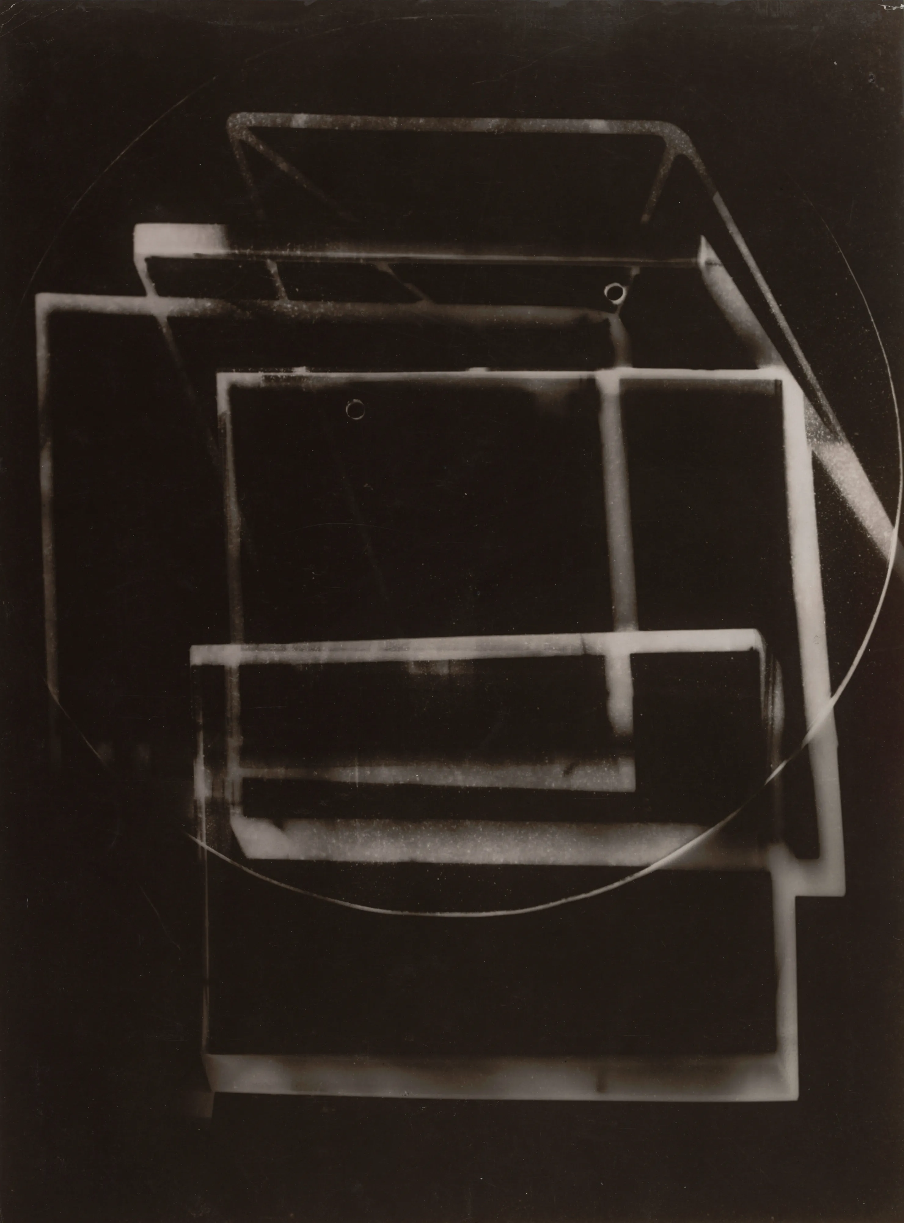 Photogram.

Moholy-Nagy was a central figure at the Bauhaus in Weimar and Dessau from 1923 to 1928 and at the New Bauhaus (later the Institute of Design) in Chicago from 1937 until his death. Both as an artist and as an educator, Moholy-Nagy used photography as a means of challenging conventions of visual perception and representation. Among the methods he advocated to promote the "new vision" was the cameraless photograph or photogram - at once the most direct and the most oblique of translations from object to photograph. Moholy-Nagy made this abstract image by resting commonplace objects on a sheet of photographic paper and exposing it to light.

The legacy of Hungarian artist Laszlo Moholy-Nagy is among the most cherished in the lineage of photographic art, and he can be defined as a visionary whose radical experiments with photography entirely re-imagined the possibilities for the medium. Working in the early 20th century when photography was not considered a form of high art, Moholy-Nagy actively sought to break down boundaries and find new languages of photographic discourse. In doing so, he left behind an oeuvre of visual ideas that have provided artistic license to a century’s worth of photographers to experiment boldly beyond the conventional definitions of what photography is expected to be.

Edition: 1 of 1