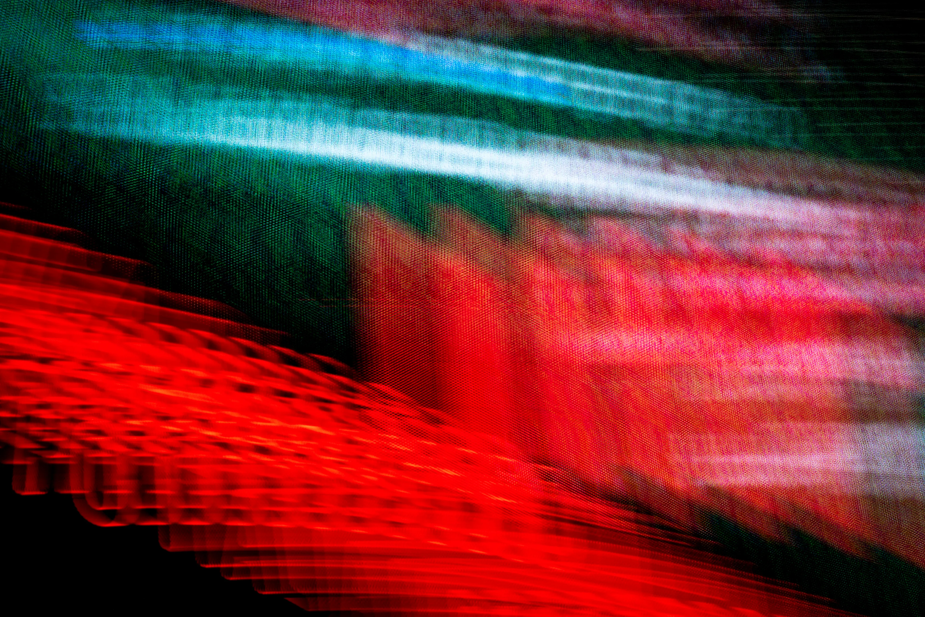 The fluidity of manual technique within the camera has brought me to a new understanding of light and the time that passes through it.   As cameras continue to simplify and automate, adopting an AI-controlled visual language & codes; I have found my power through the intentional use of controls within the lens.   Using a digital large format camera, the images are lit by the waves of phosphorus, neon, and the light-emitting diodes (LED) found in contemporary public advertisements.  The resulting photographs create a textural mapping of wave emissions through fluid control of the camera. The location of capture reveals itself in pieces; landmarks, lighting, advertising signage, and hints of human aspects. Details bring recognition of elements within Time Square and Broadway, my main playgrounds for this project.  Studying Howard Edgerton & Laslo Moholy-Nagy, I found a like-minded curiosity within the interaction between time and light.  These are my transmissions of light. 6000x4000